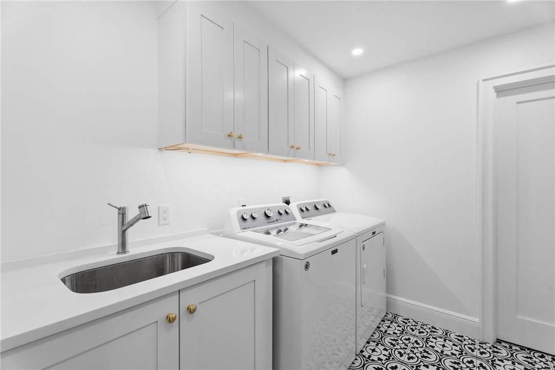 1070 Beach Road, Unit 1070 Vero Beach, FL 32963 - Photo 18 of 36 a bathroom with a sink and cabinets