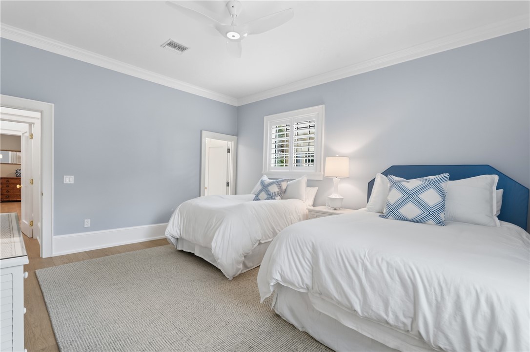 1070 Beach Road, Unit 1070 Vero Beach, FL 32963 - Photo 23 of 36 a bedroom with two beds and a window