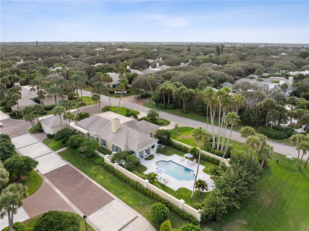 1070 Beach Road, Unit 1070 Vero Beach, FL 32963 - Photo 3 of 36 an aerial view of residential houses with outdoor space and trees