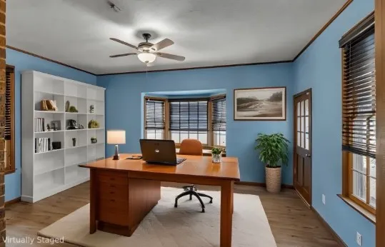 a work room with furniture and windows