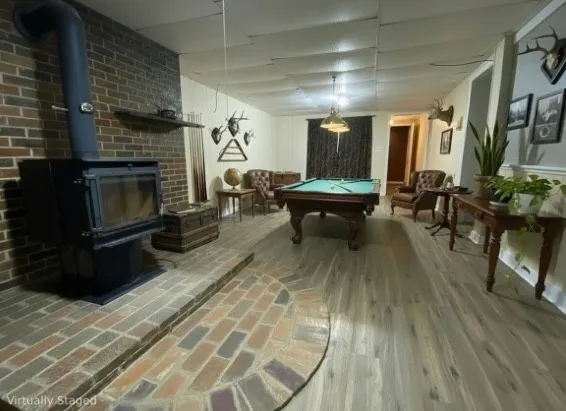 an empty room with wooden floor