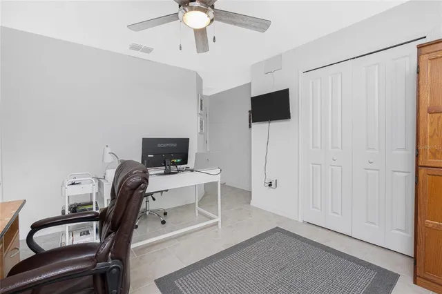 a view of a workspace with furniture