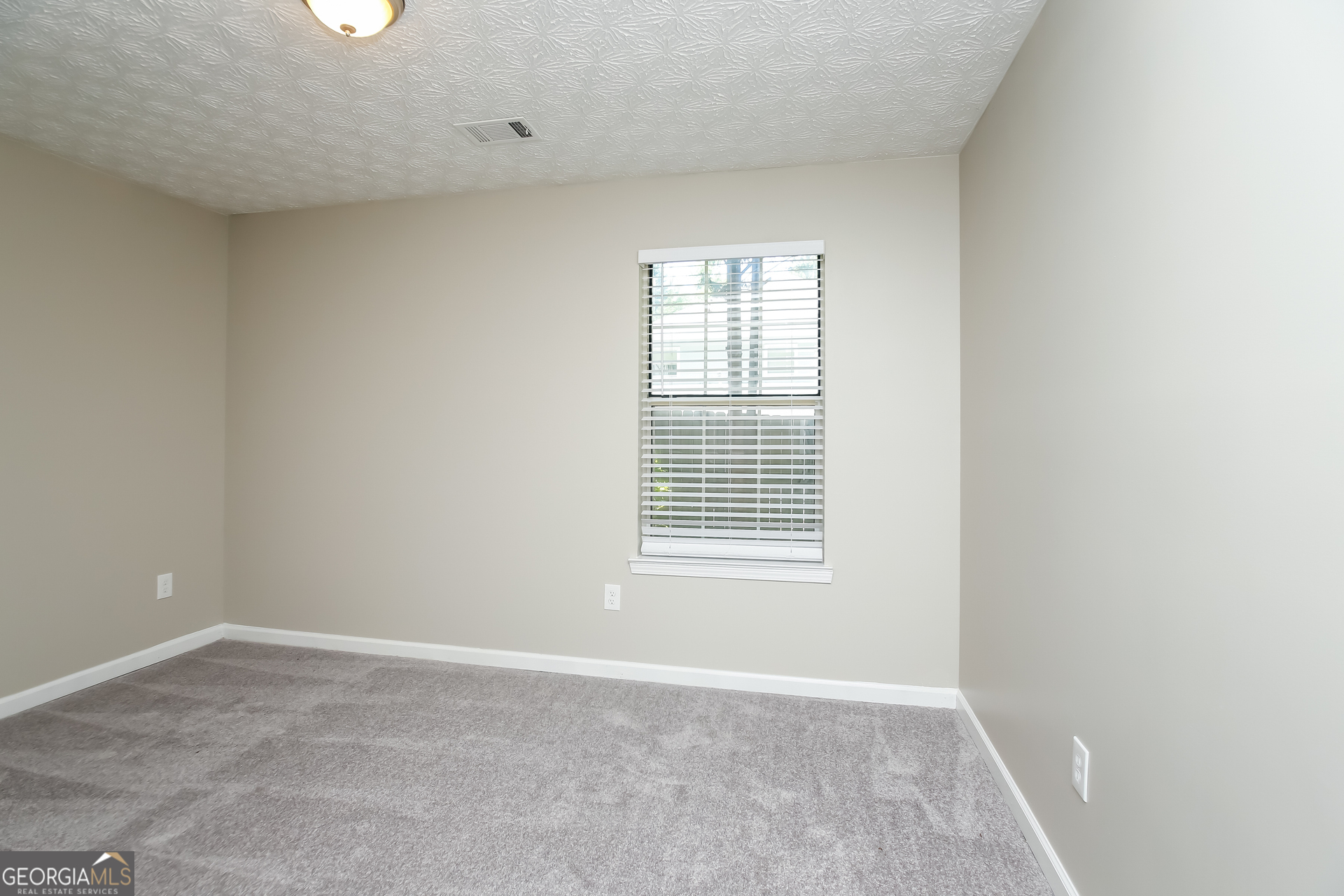 4508 High Grove Court Northwest Acworth, GA 30102 - Photo 11 of 16 an empty room with a window