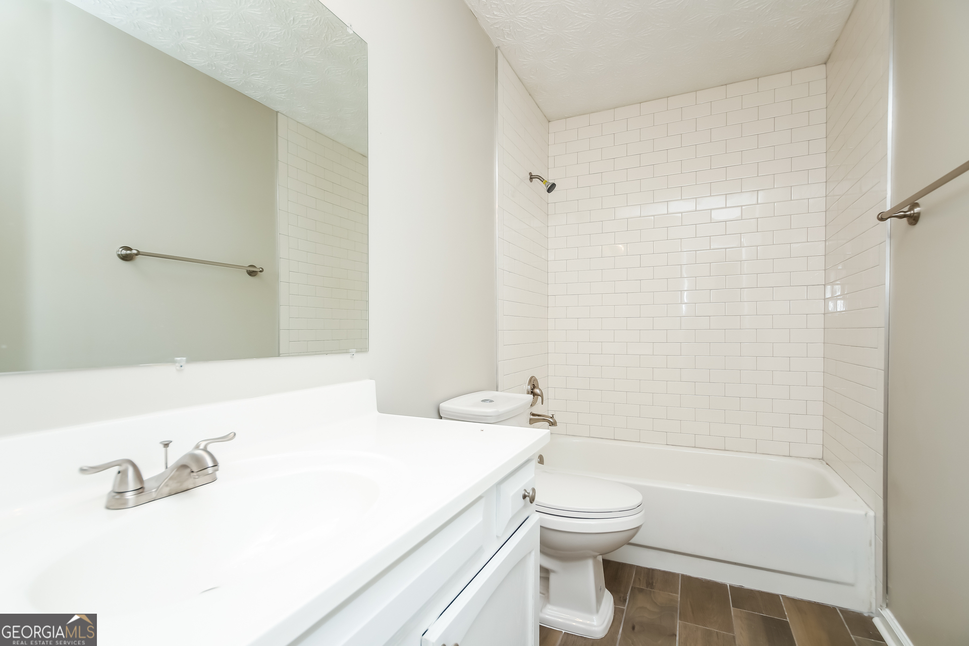 4508 High Grove Court Northwest Acworth, GA 30102 - Photo 14 of 16 a bathroom with a sink a toilet and shower