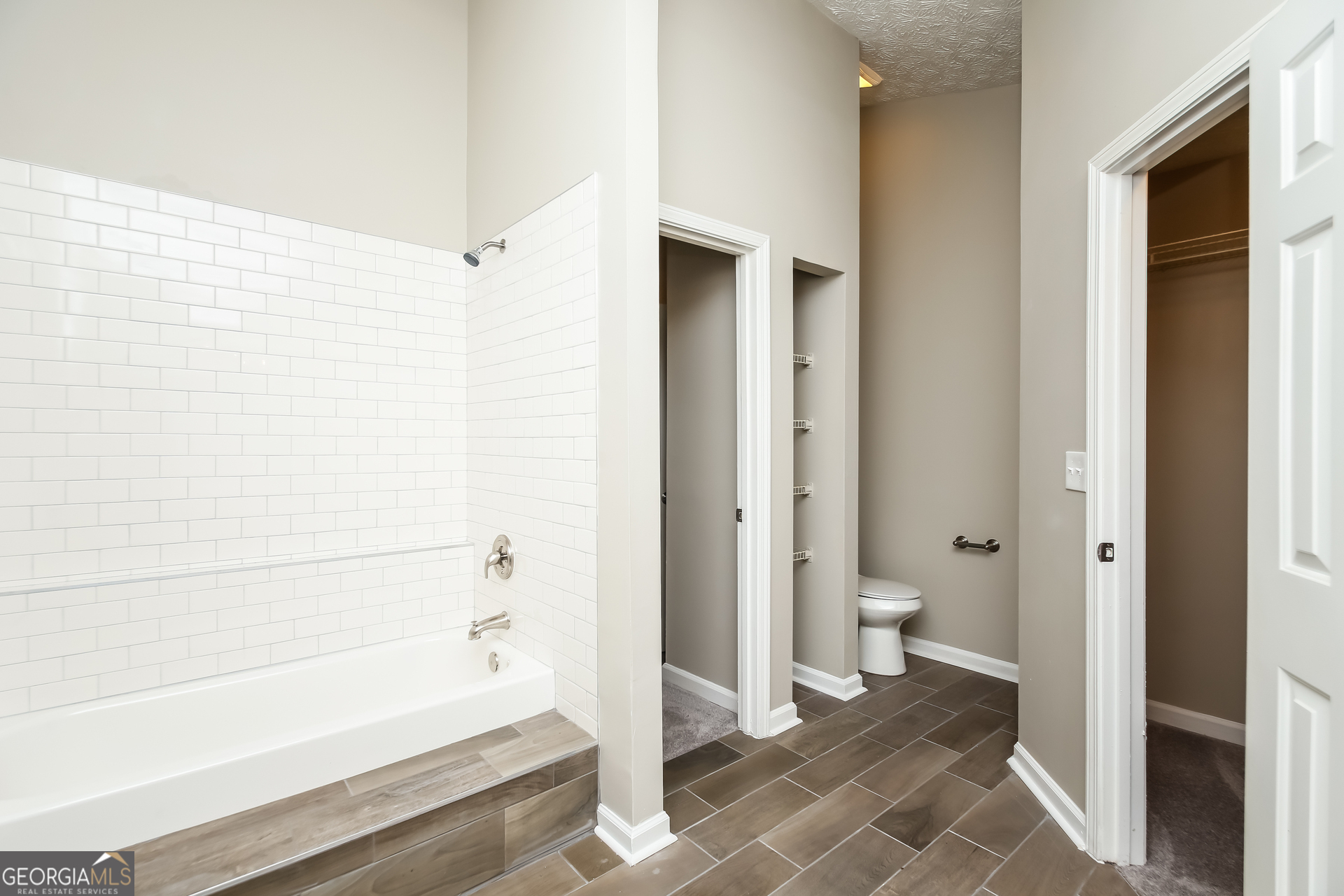 4508 High Grove Court Northwest Acworth, GA 30102 - Photo 10 of 16 a bathroom with a bathtub and a shower