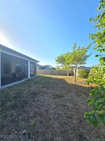 a view of a yard with an outdoor space