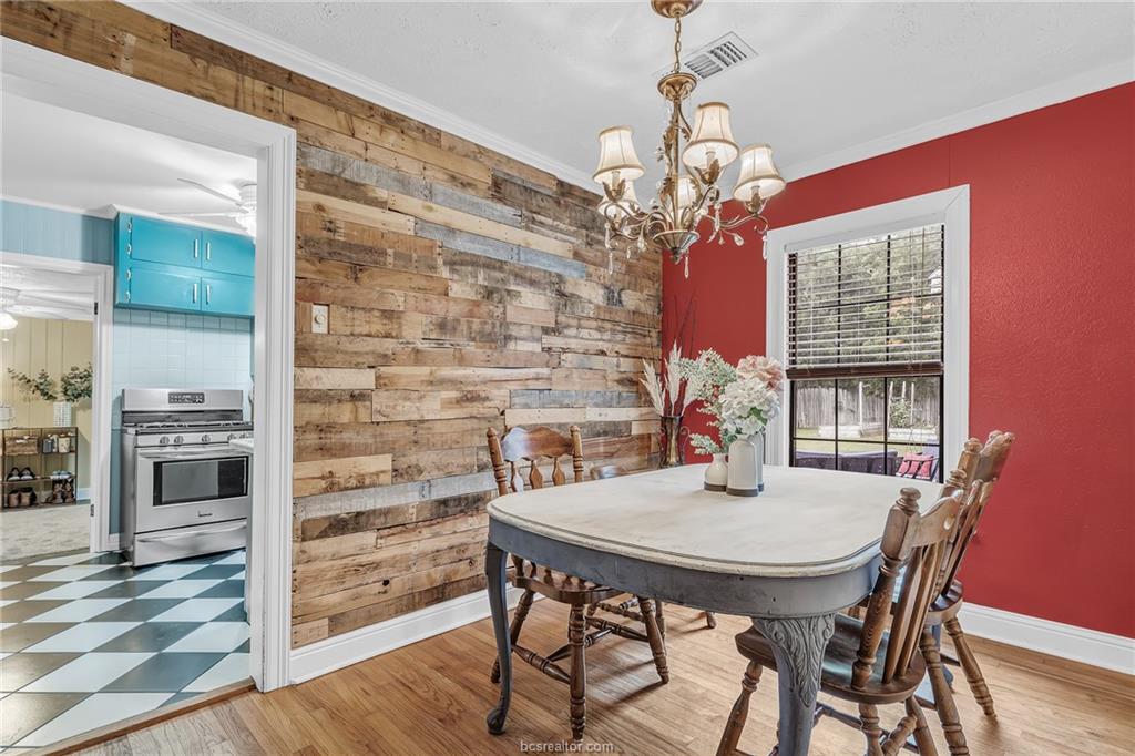 1414 East 29th Street Bryan, TX 77802 - Photo 6 of 21 a view of a dining room with furniture window and wooden floor