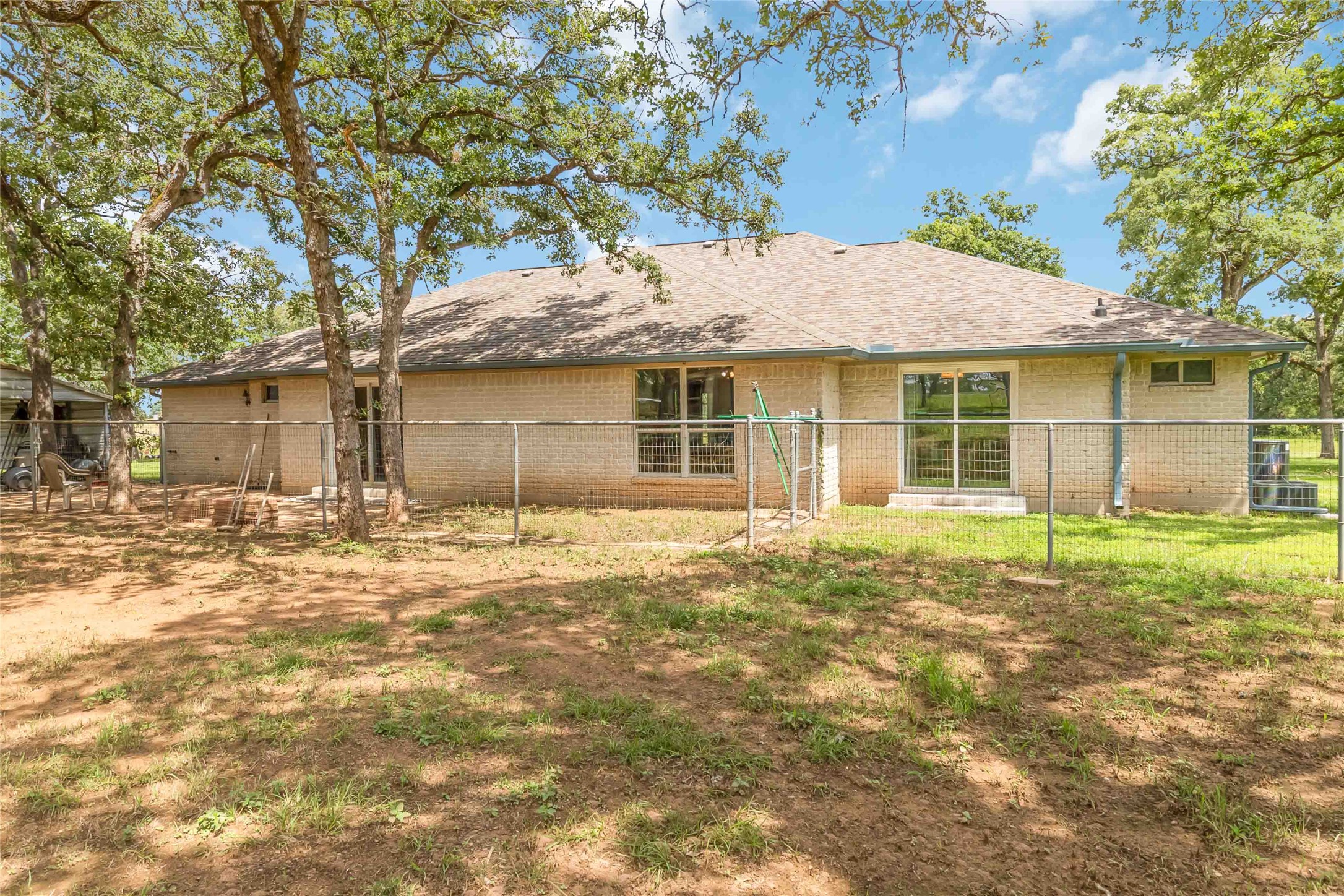 1208 Jeddo Road Rosanky, TX 78953 - Photo 32 of 40 A well-maintained fenced yard offers a tranquil outdoor retreat.