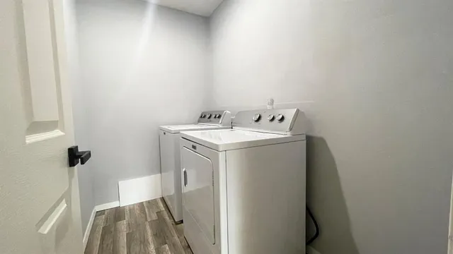 a utility room with dryer and washer