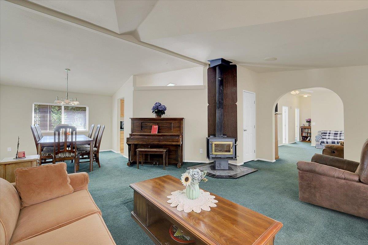 138 Big Fir Road Forbestown, CA 95941 - Photo 11 of 56 a living room with furniture and a flat screen tv