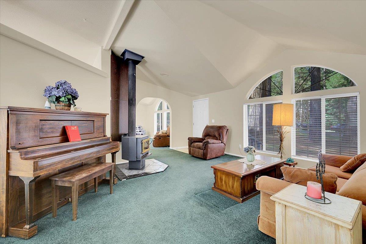 138 Big Fir Road Forbestown, CA 95941 - Photo 12 of 56 a living room with furniture and a flat screen tv