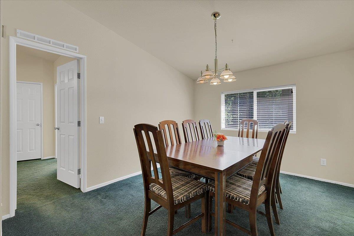 138 Big Fir Road Forbestown, CA 95941 - Photo 14 of 56 a view of a dining room with furniture window and wooden floor