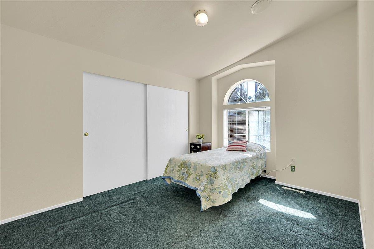 138 Big Fir Road Forbestown, CA 95941 - Photo 36 of 56 a bedroom with a bed and a window