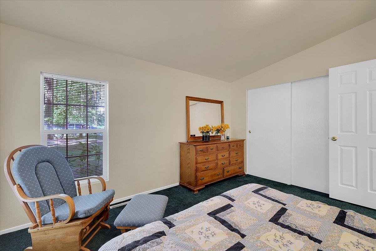 138 Big Fir Road Forbestown, CA 95941 - Photo 39 of 56 a bed room with furniture and a window