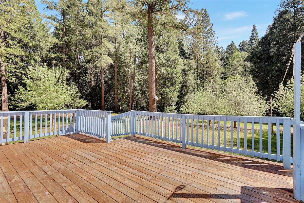 138 Big Fir Road Forbestown, CA 95941 - Photo 53 of 56 a balcony with wooden floor and fence