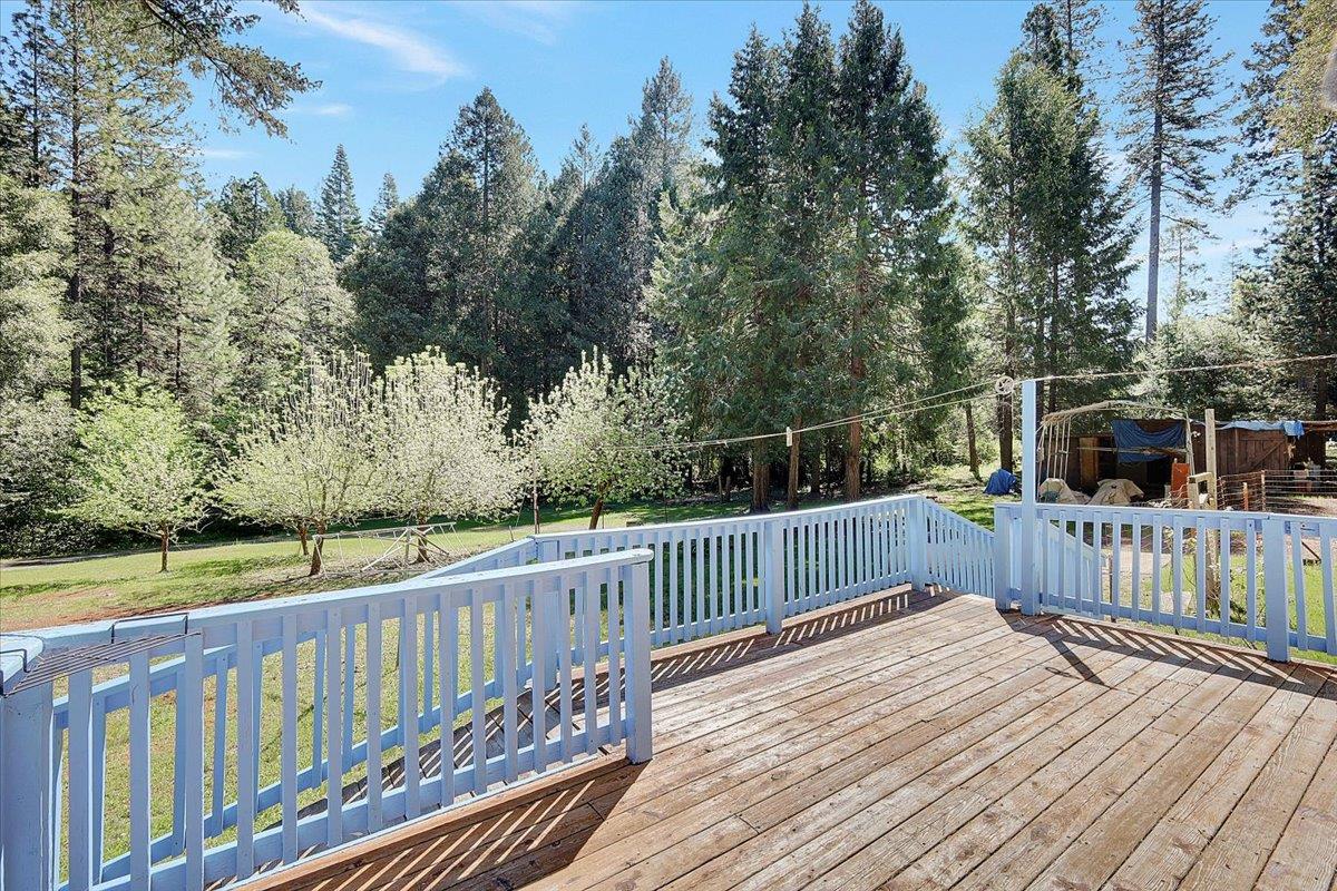 138 Big Fir Road Forbestown, CA 95941 - Photo 55 of 56 a view of a wooden deck with a yard