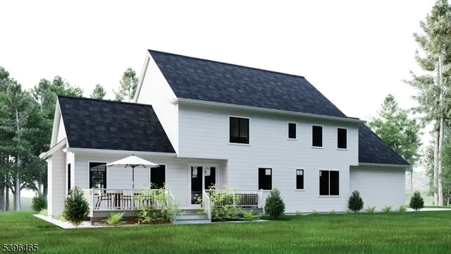 a view of house with a yard