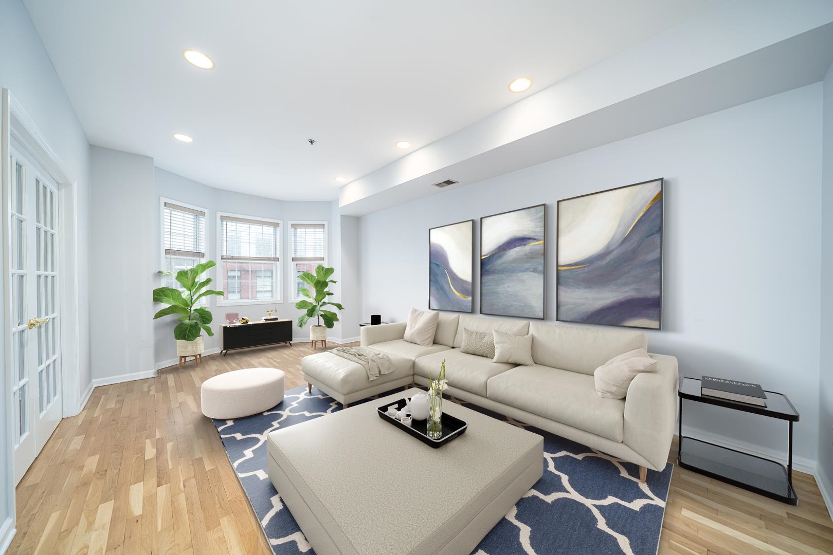 122 Monroe Street, Unit 3 Hoboken, NJ 07030 - Photo 9 of 24 a living room with furniture and a wooden floor