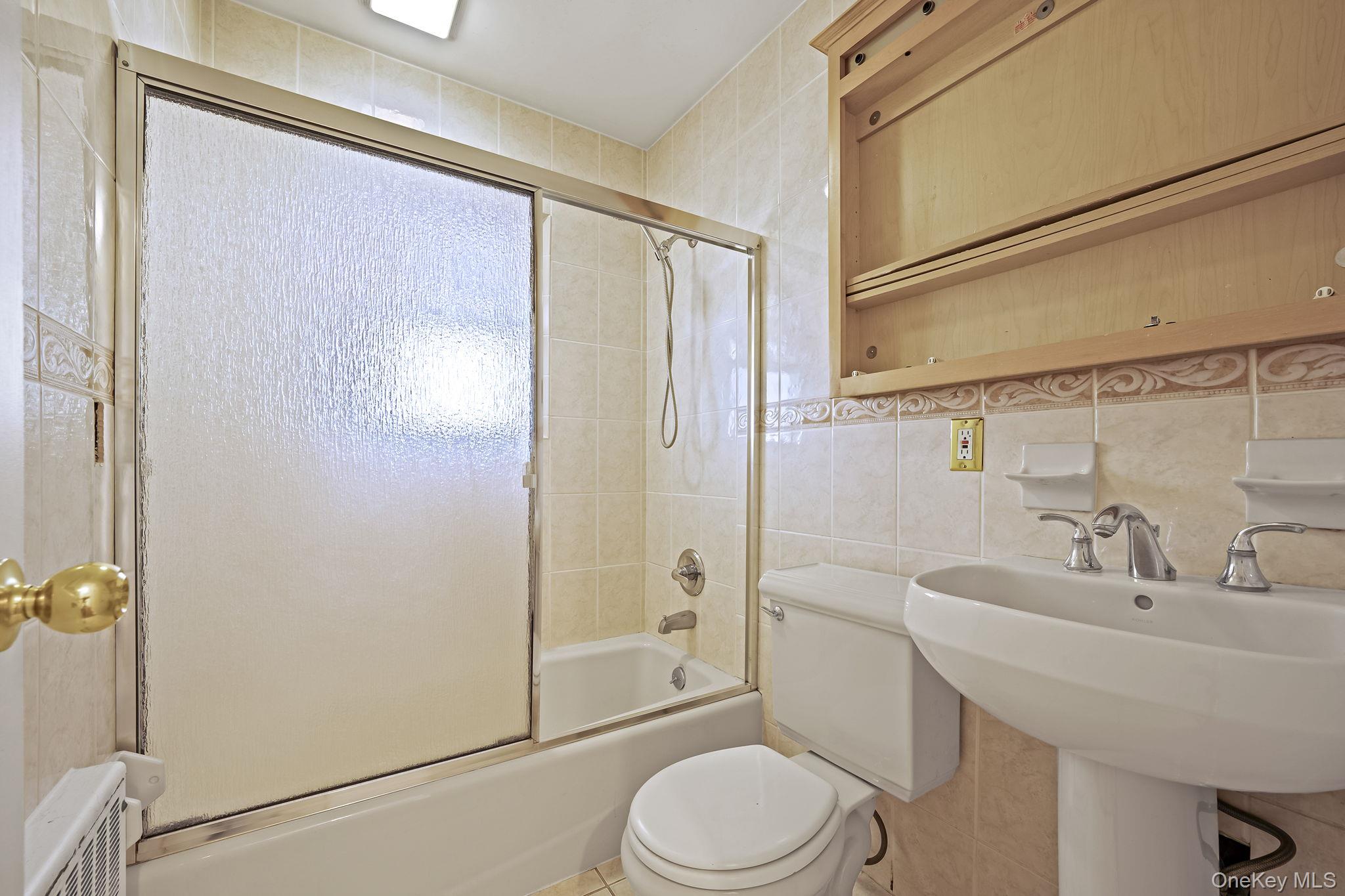2001 North Jerusalem Road East Meadow, NY 11554 - Photo 20 of 31 a bathroom with a sink toilet and shower