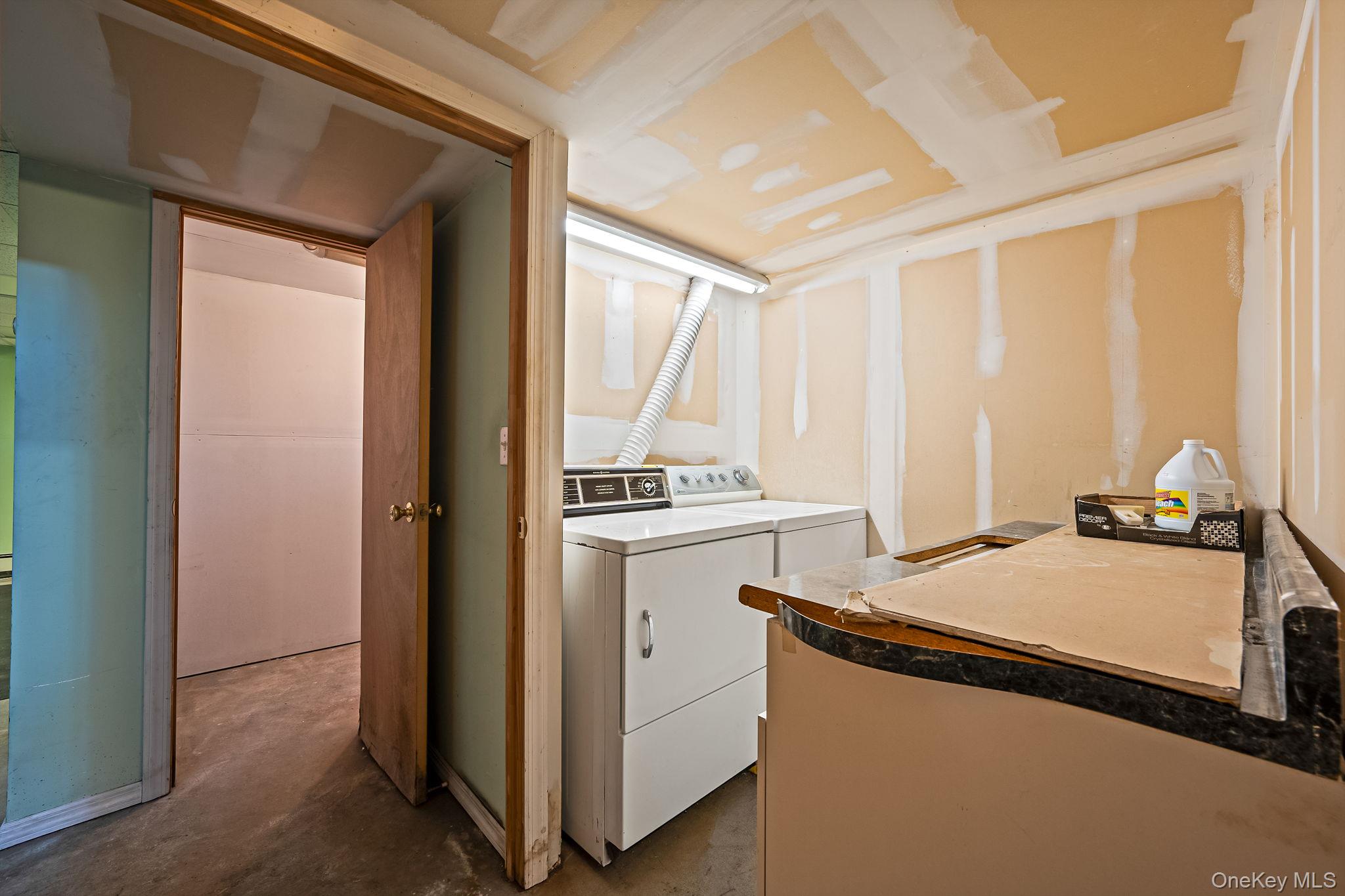 2001 North Jerusalem Road East Meadow, NY 11554 - Photo 27 of 31 a utility room with dryer and washer