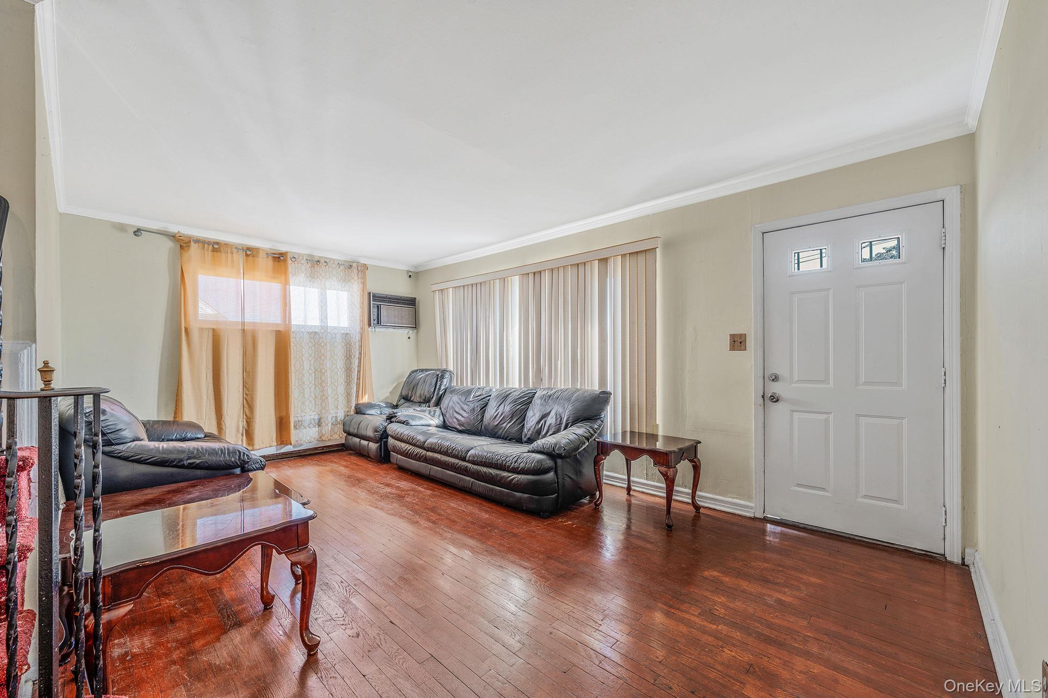 2001 North Jerusalem Road East Meadow, NY 11554 - Photo 7 of 31 a living room with furniture and a window