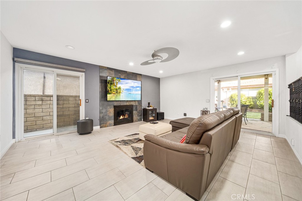 12 Rolling Hills Drive Phillips Ranch, CA 91766 - Photo 17 of 40 a living room with furniture and a fireplace