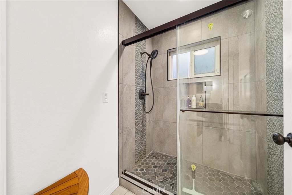 12 Rolling Hills Drive Phillips Ranch, CA 91766 - Photo 21 of 40 a bathroom with a shower