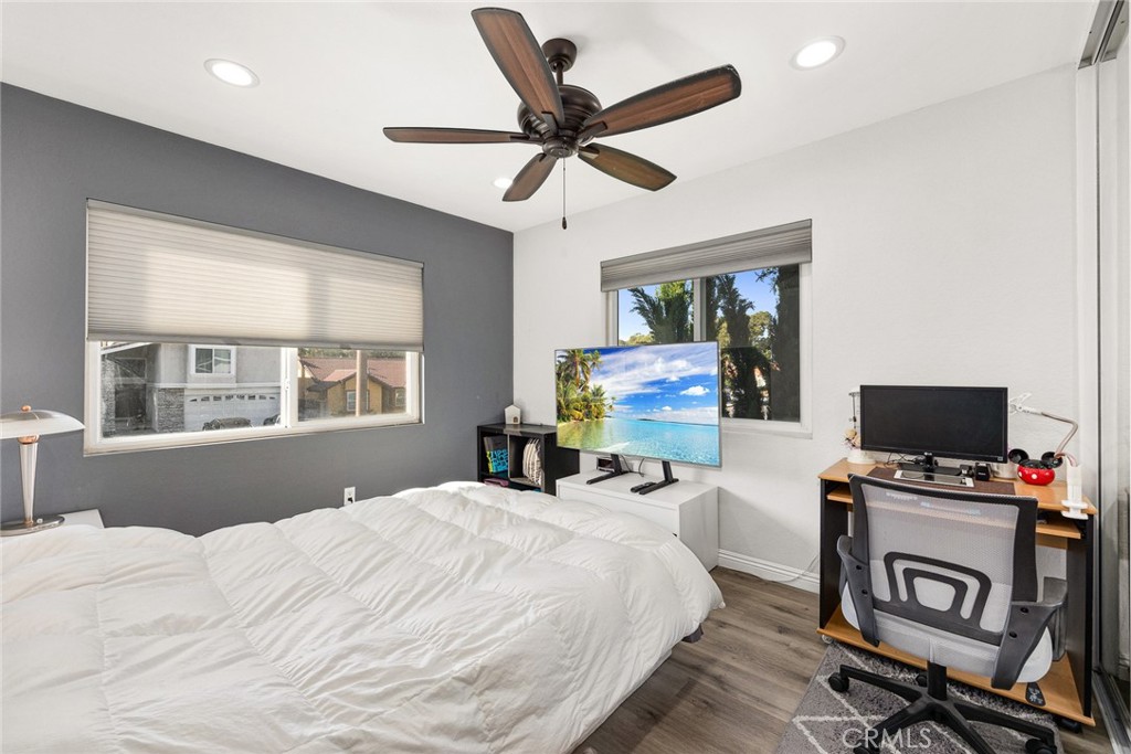 12 Rolling Hills Drive Phillips Ranch, CA 91766 - Photo 28 of 40 a bedroom with a bed and a flat screen tv