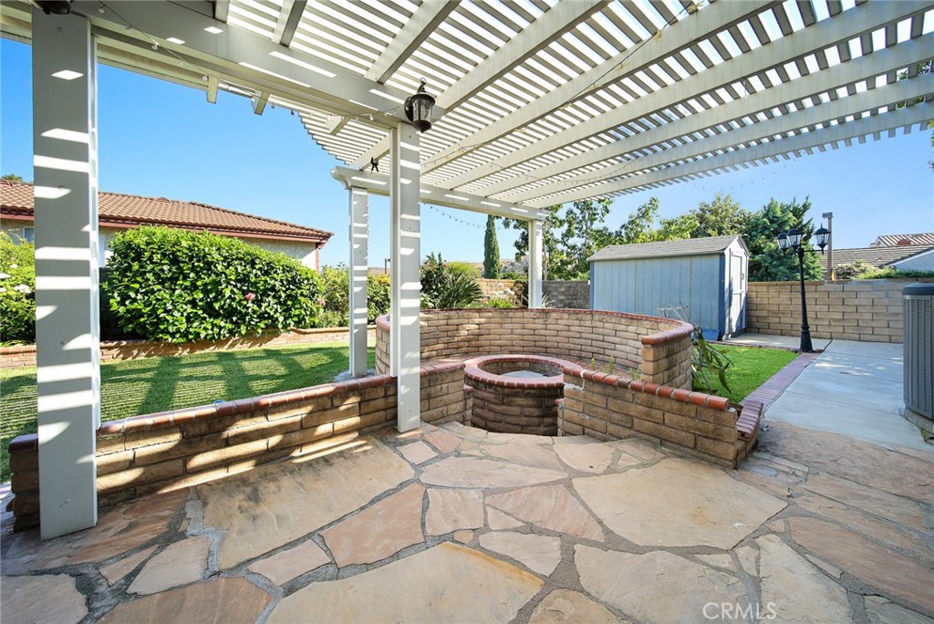 12 Rolling Hills Drive Phillips Ranch, CA 91766 - Photo 34 of 40 a building outdoor space with patio furniture and potted plants