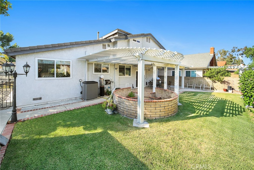 12 Rolling Hills Drive Phillips Ranch, CA 91766 - Photo 35 of 40 a view of a house with a yard