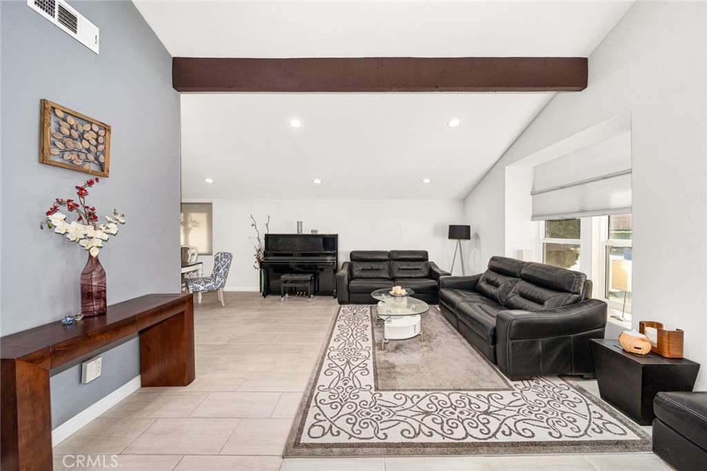 12 Rolling Hills Drive Phillips Ranch, CA 91766 - Photo 7 of 40 a living room with furniture and a rug