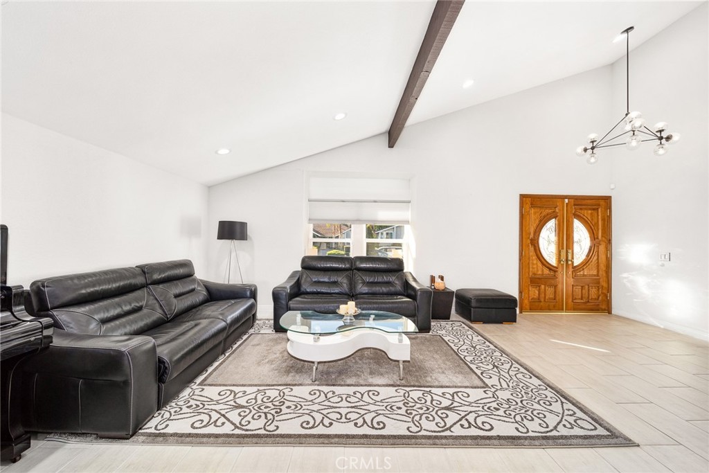 12 Rolling Hills Drive Phillips Ranch, CA 91766 - Photo 8 of 40 a living room with furniture and wooden floor