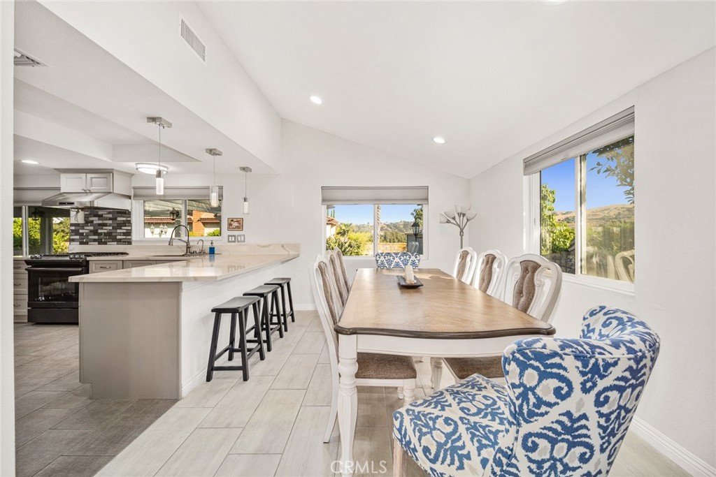 12 Rolling Hills Drive Phillips Ranch, CA 91766 - Photo 10 of 40 a view of a dining room with furniture
