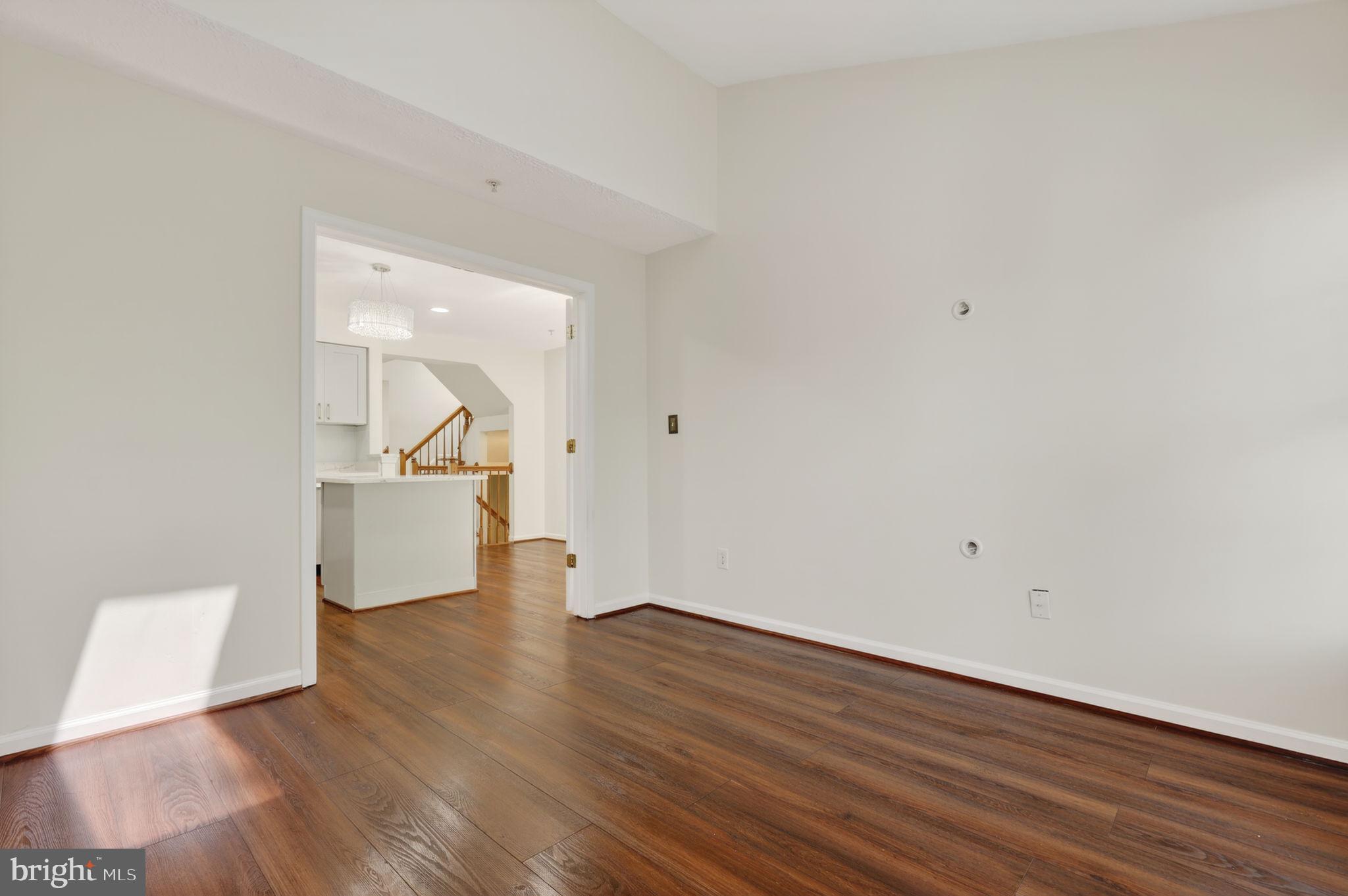 8612 Fire Rock Road Laurel, MD 20724 - Photo 20 of 57 a view of empty room with wooden floor