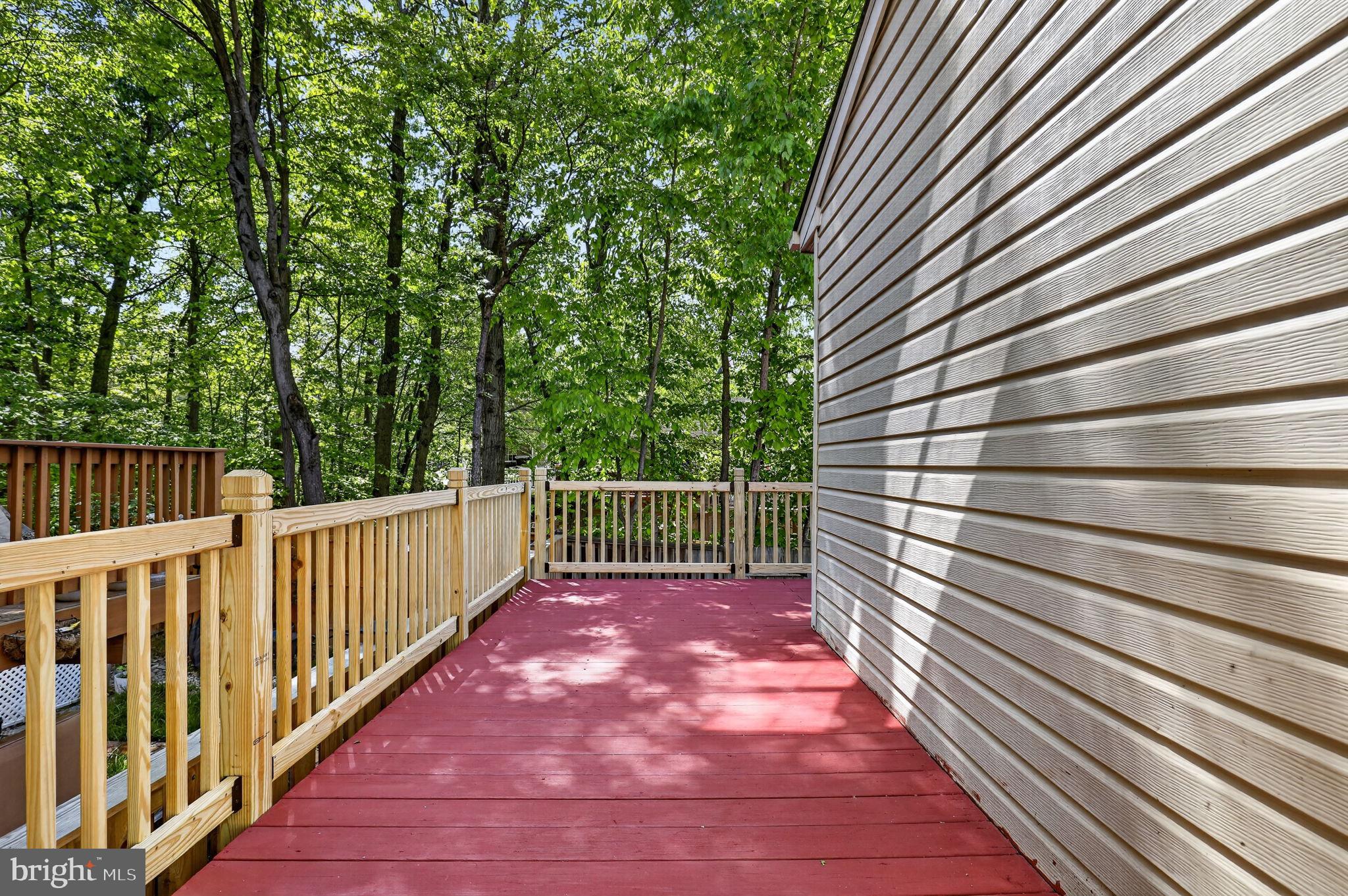 8612 Fire Rock Road Laurel, MD 20724 - Photo 22 of 57 a view of a garden with wooden fence