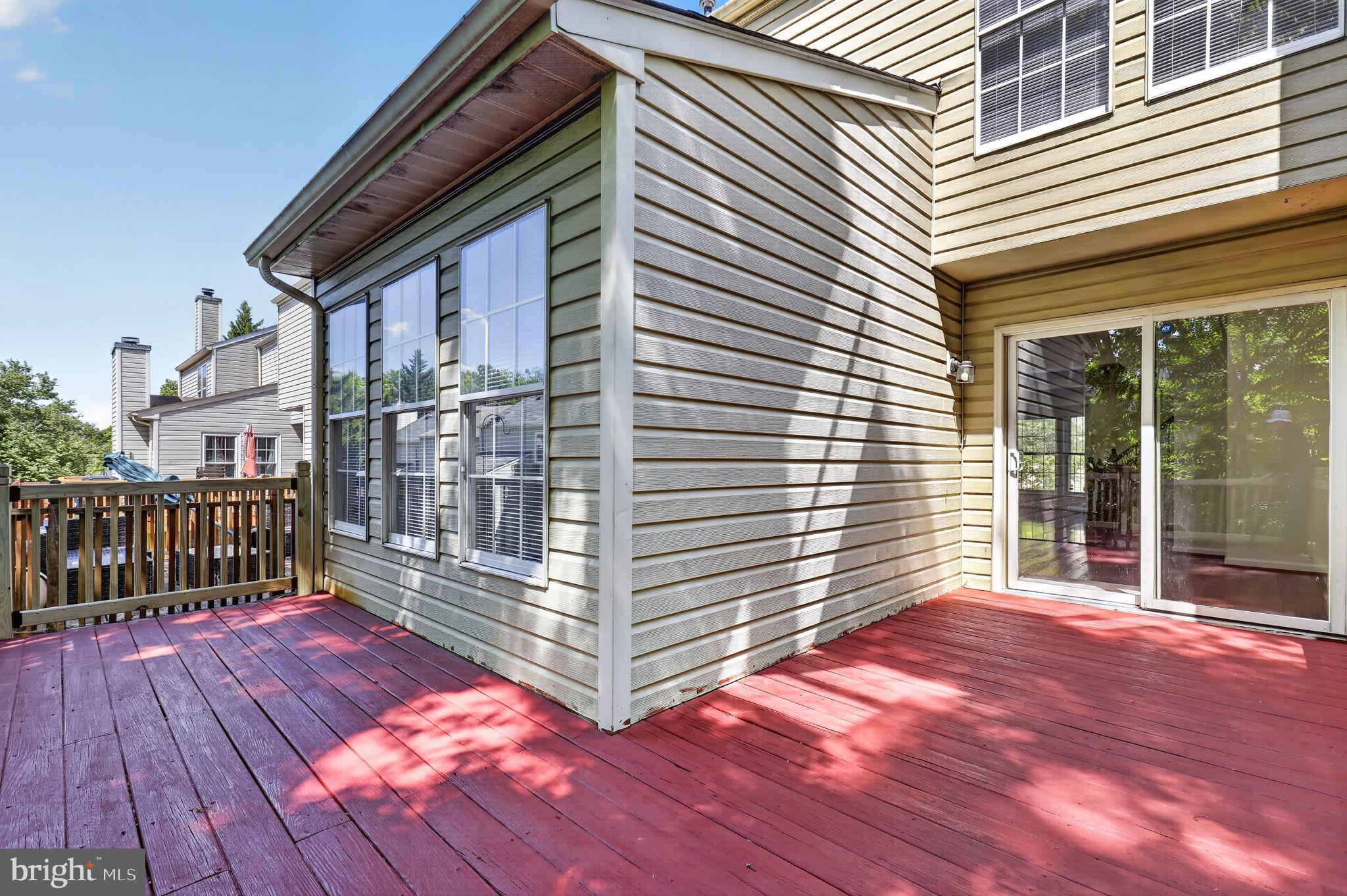 8612 Fire Rock Road Laurel, MD 20724 - Photo 23 of 57 a view of a deck with a sink and wooden floor