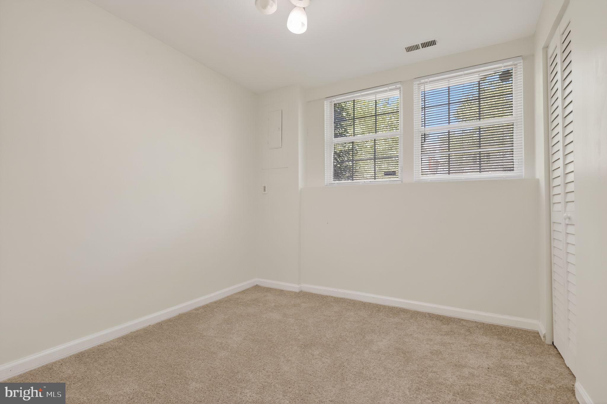 8612 Fire Rock Road Laurel, MD 20724 - Photo 37 of 57 an empty room with windows