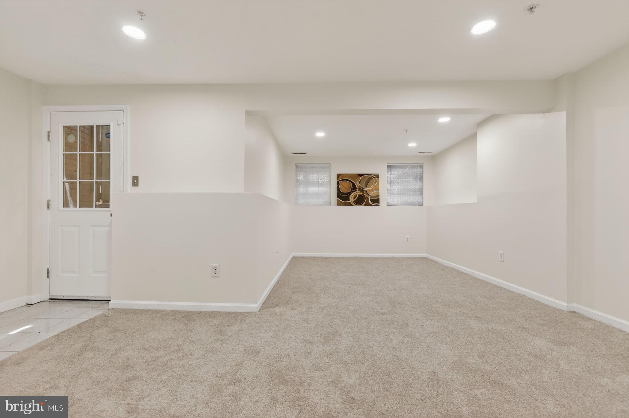8612 Fire Rock Road Laurel, MD 20724 - Photo 41 of 57 an empty room with a empty space and windows
