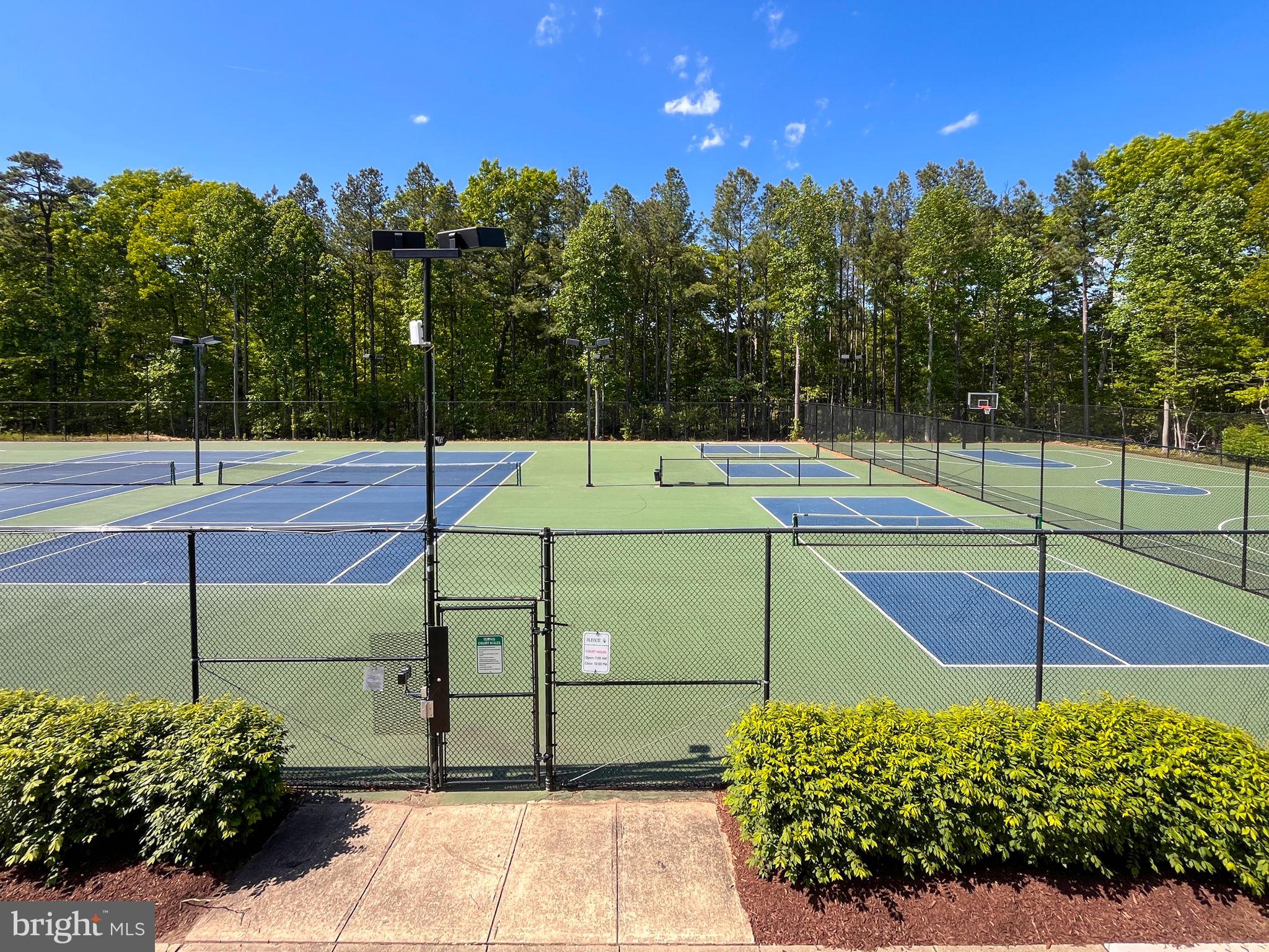 8612 Fire Rock Road Laurel, MD 20724 - Photo 53 of 57 a view of a tennis court
