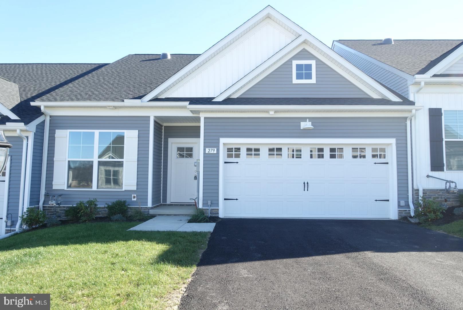 279 Ridgeview Lane, Unit 49 Hanover, PA 17331 - Photo 2 of 19 a front view of a house with garden