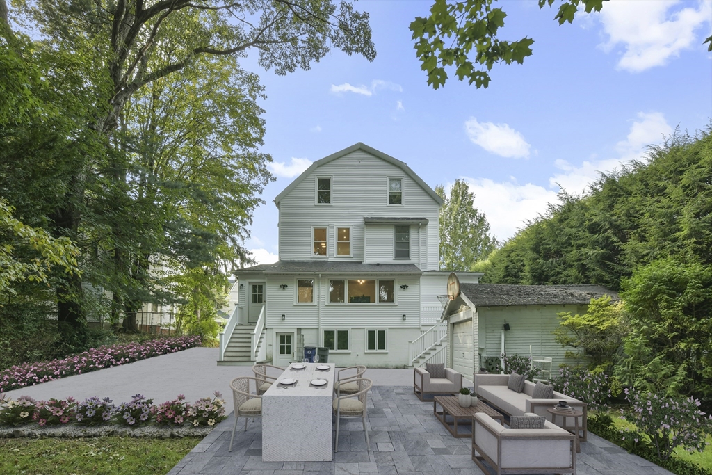 26 Bartlett Avenue Arlington, MA 02476 - Photo 27 of 27 a front view of a house with garden