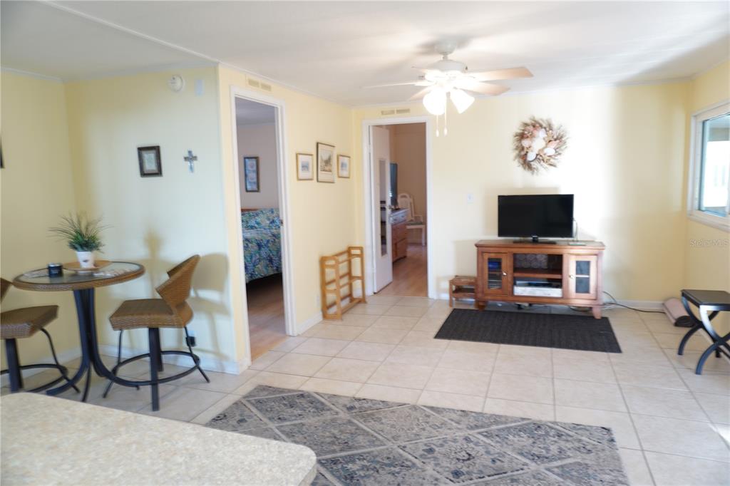 145 Rarotonga Road North Port, FL 34287 - Photo 17 of 64 a living room with furniture and a flat screen tv
