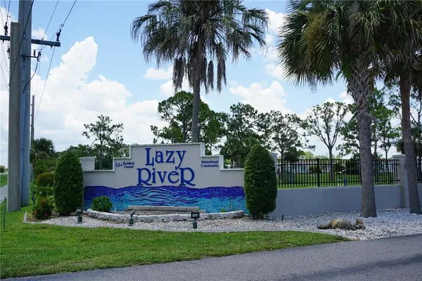 a view of a park with palm trees