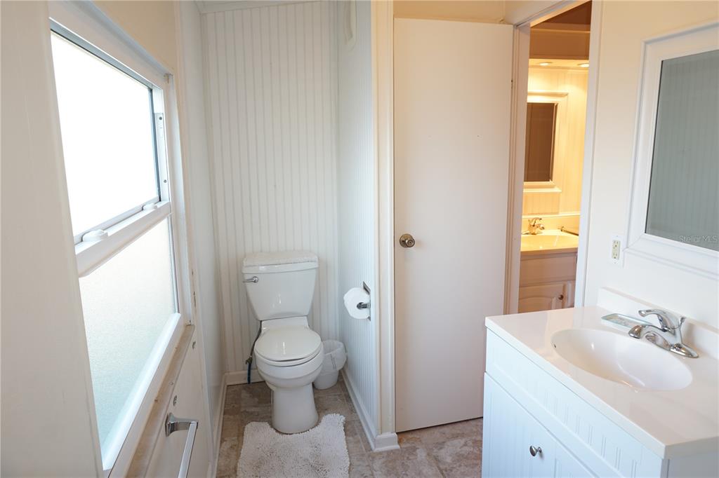 145 Rarotonga Road North Port, FL 34287 - Photo 22 of 64 a bathroom with a sink toilet and shower