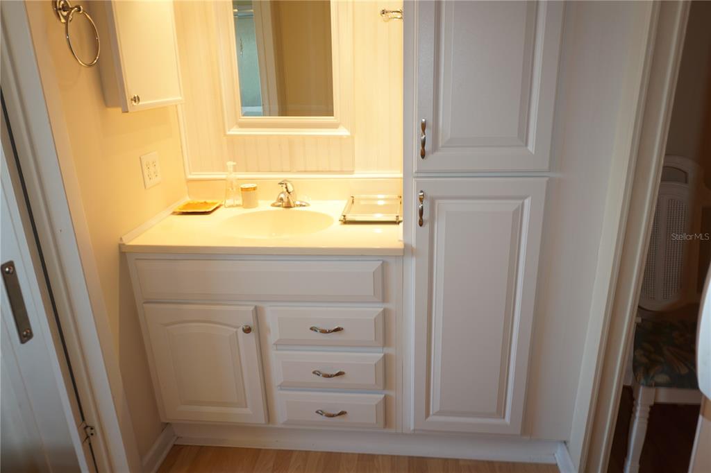 145 Rarotonga Road North Port, FL 34287 - Photo 24 of 64 a bathroom with a sink and a mirror