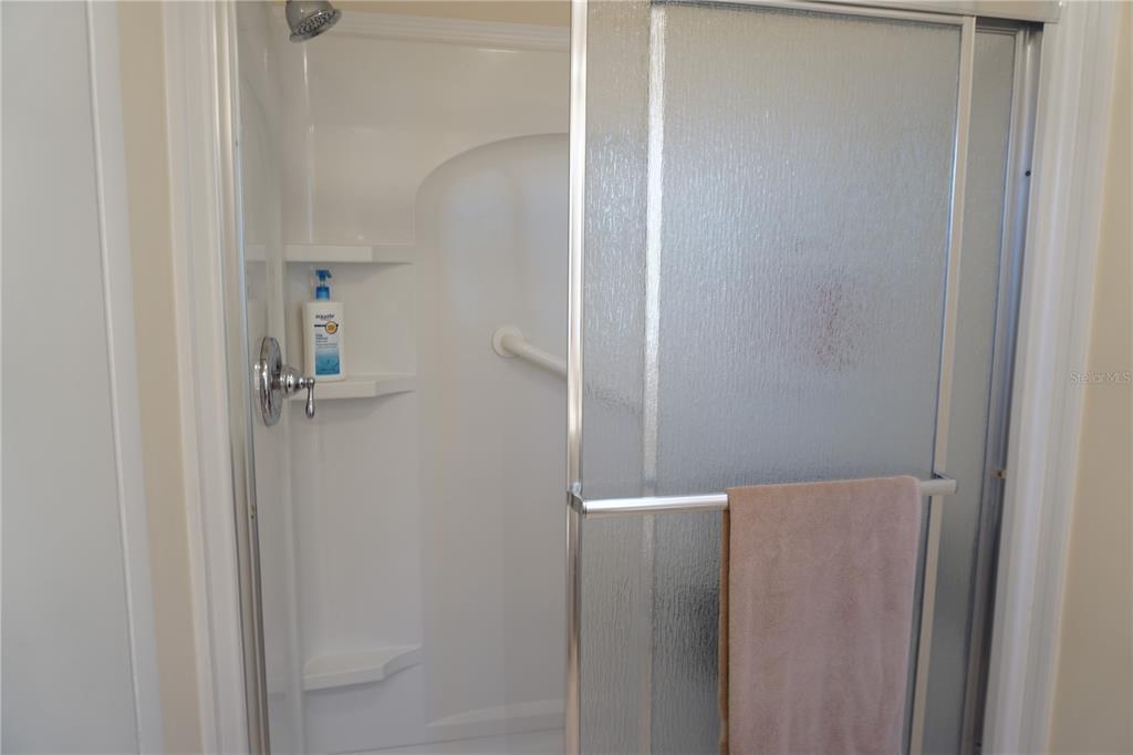 145 Rarotonga Road North Port, FL 34287 - Photo 28 of 64 a bathroom with a shower