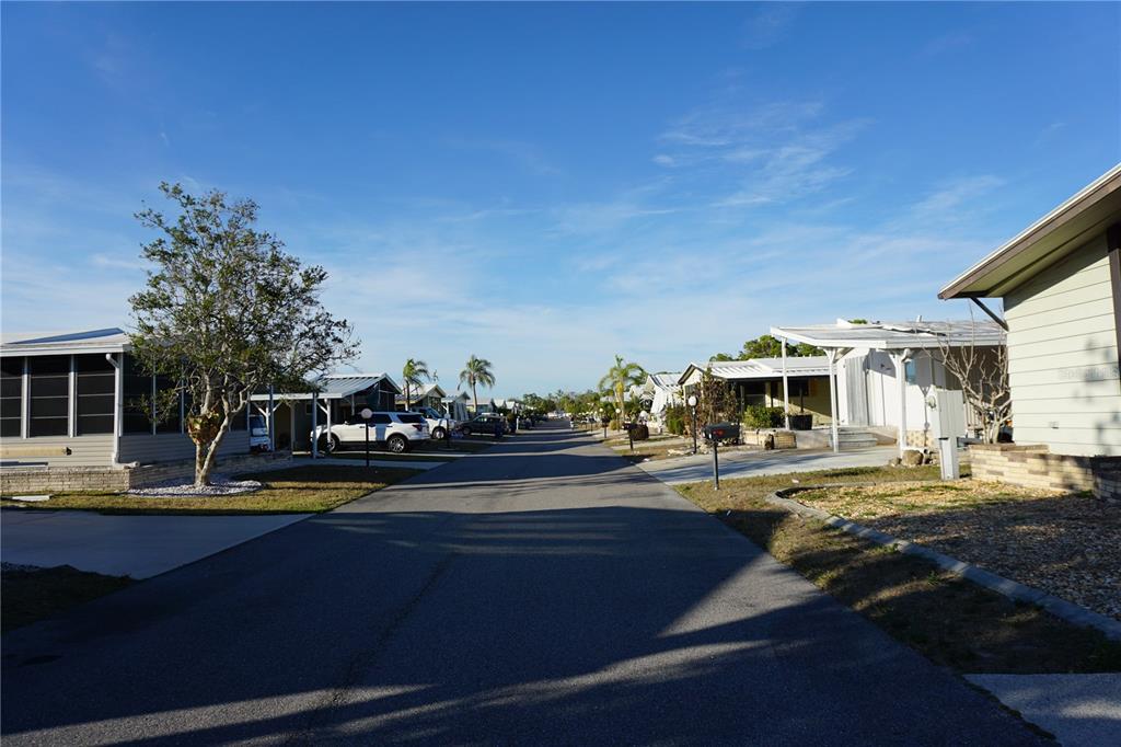 145 Rarotonga Road North Port, FL 34287 - Photo 36 of 64 a view of a lake with houses
