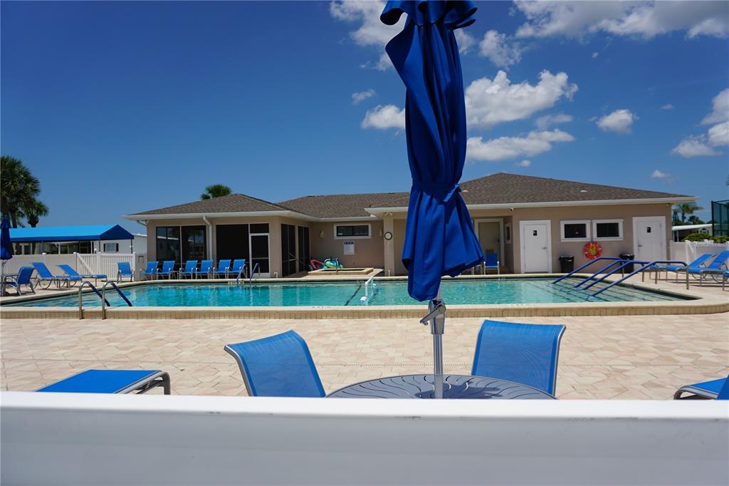 145 Rarotonga Road North Port, FL 34287 - Photo 38 of 64 a front view of house with yard and green space