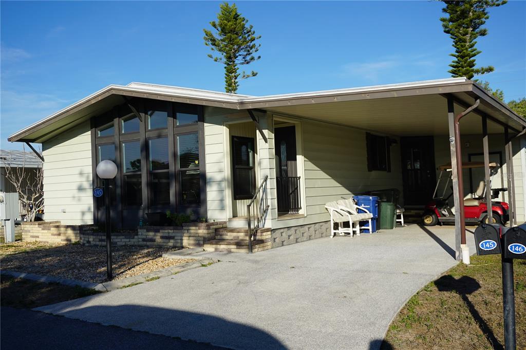 145 Rarotonga Road North Port, FL 34287 - Photo 4 of 64 a view of a house with sitting area
