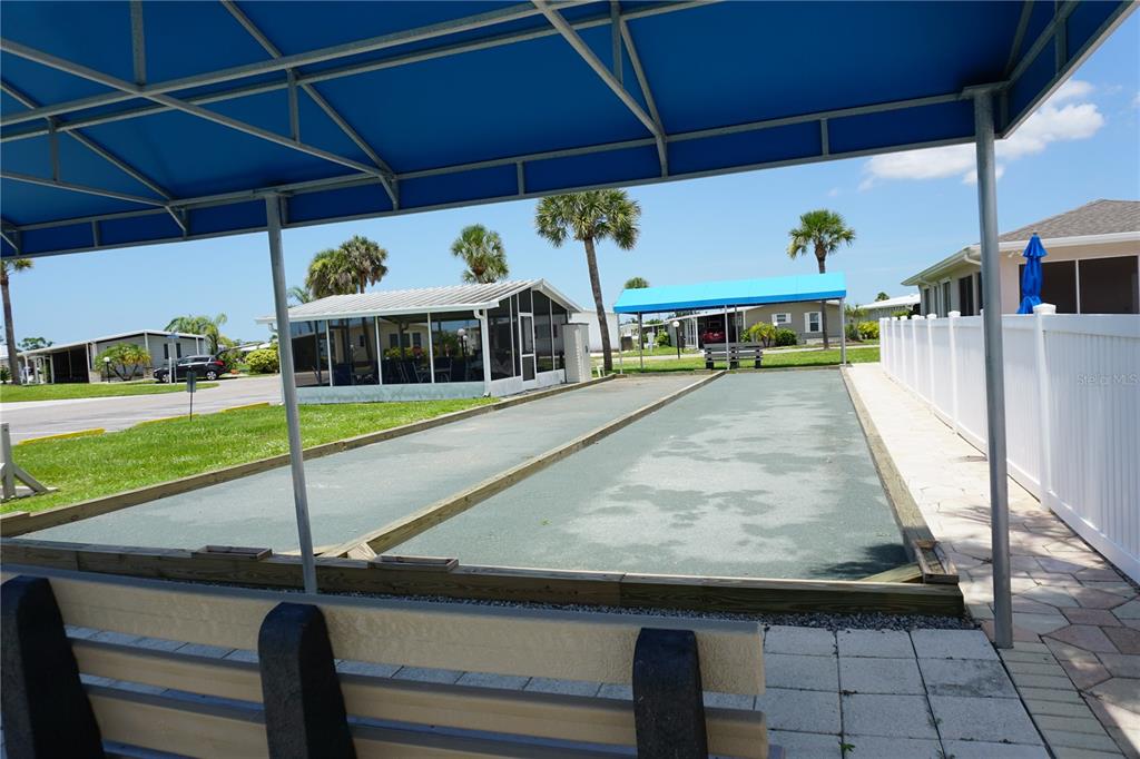 145 Rarotonga Road North Port, FL 34287 - Photo 44 of 64 a view of a swimming pool with a patio